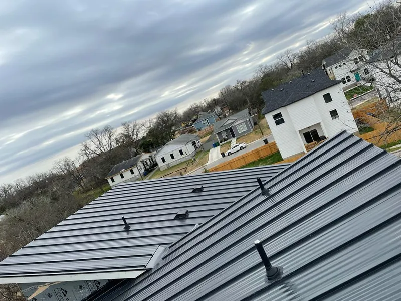 Standing seam metal roof panels with vents for Skylight Repair in West Pleasant View